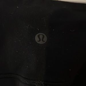 Lululemon leggings in black size 2 with design in leg.